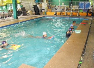 Blind school children learn to swim with the aid of the PSC.